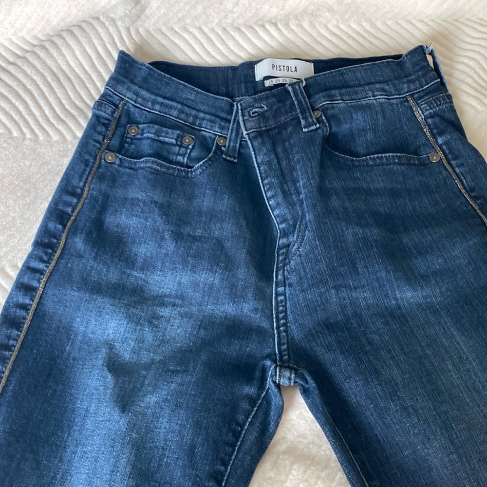 Pistola Skinny Jeans light wash, open hem. Size 27. Lightly distressed.